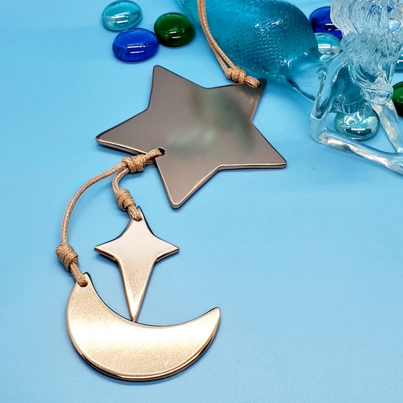 Silvertone and goldtone matte metal Star twinkle and moon black cord necklace - Picture 2 of 4